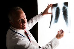 Pulmonologist holding x-ray
