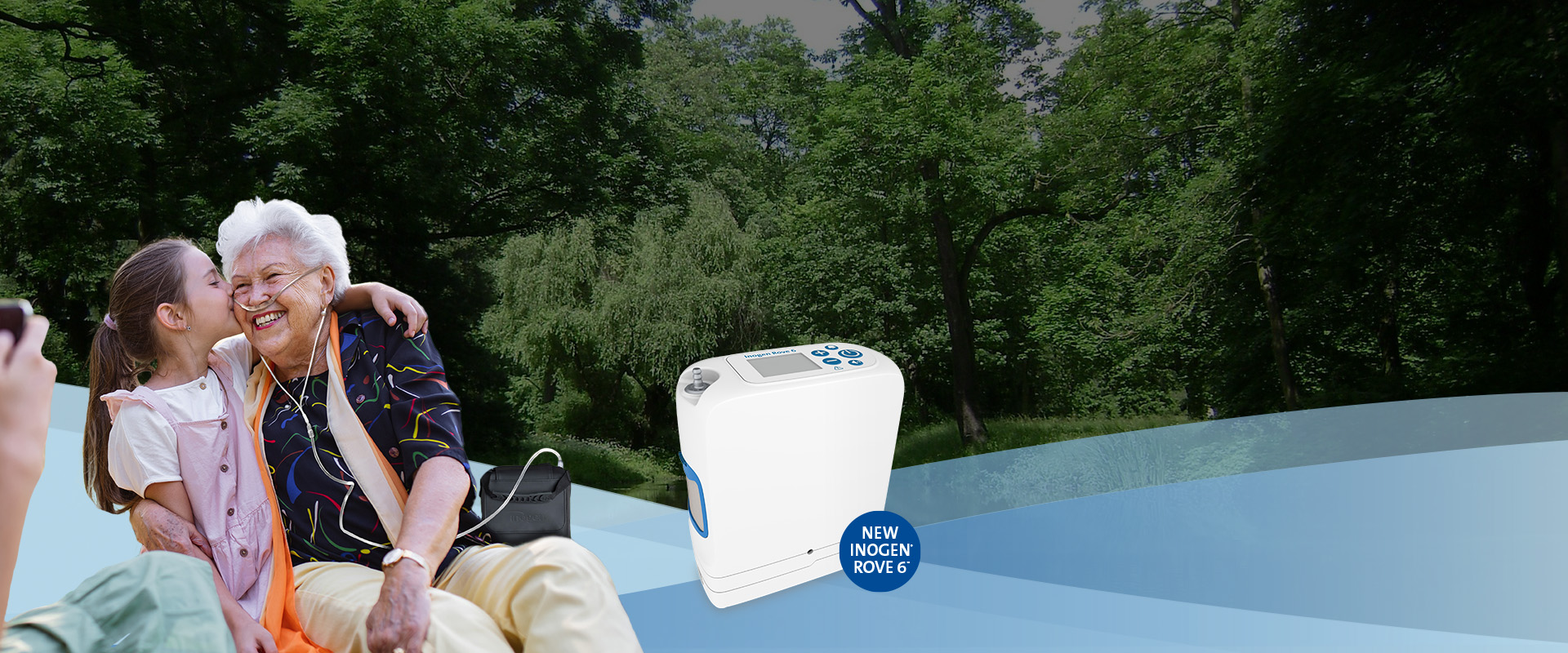 Grandma and granddaughter posing with Inogen Portable Oxygen Concentrator